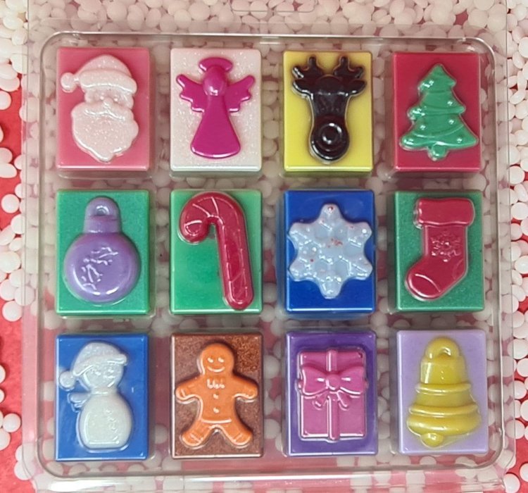 12 Days of Christmas wax melts in festive shapes and colors.