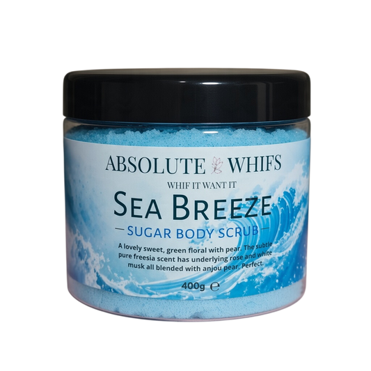 Absolute Whifs Sea Breeze sugar body scrub in a clear 400g jar with a black lid and blue exfoliating sugar crystals.