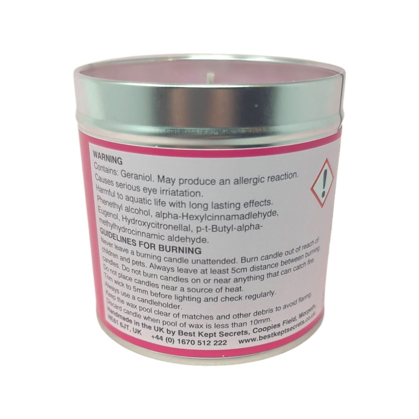 Wild Rose Scented Candle - Scented candle in a tin, featuring vibrant packaging for Seriously Scented Candle β Wild Rose, with safety warnings and burning guidelines.