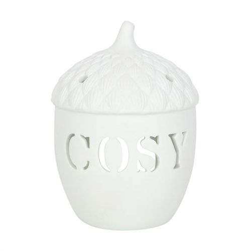 Acorn-shaped tealight holder with "COSY" cutout design.