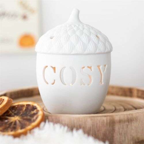 Acorn tealight holder with "COSY" design, made from durable materials, for creating a warm ambiance.