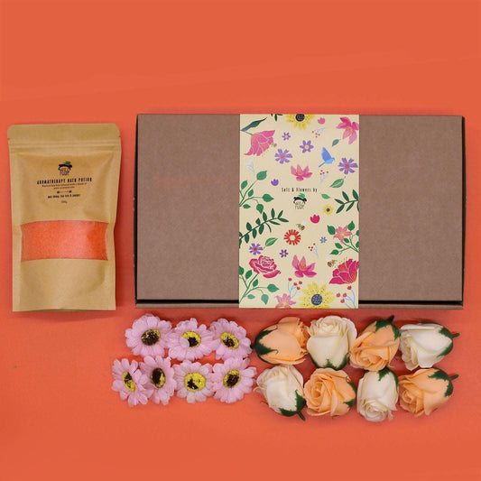 Salt soak set with natural salts, essential oils, flower petals, and elegant gift packaging for detox and relaxation bath rituals