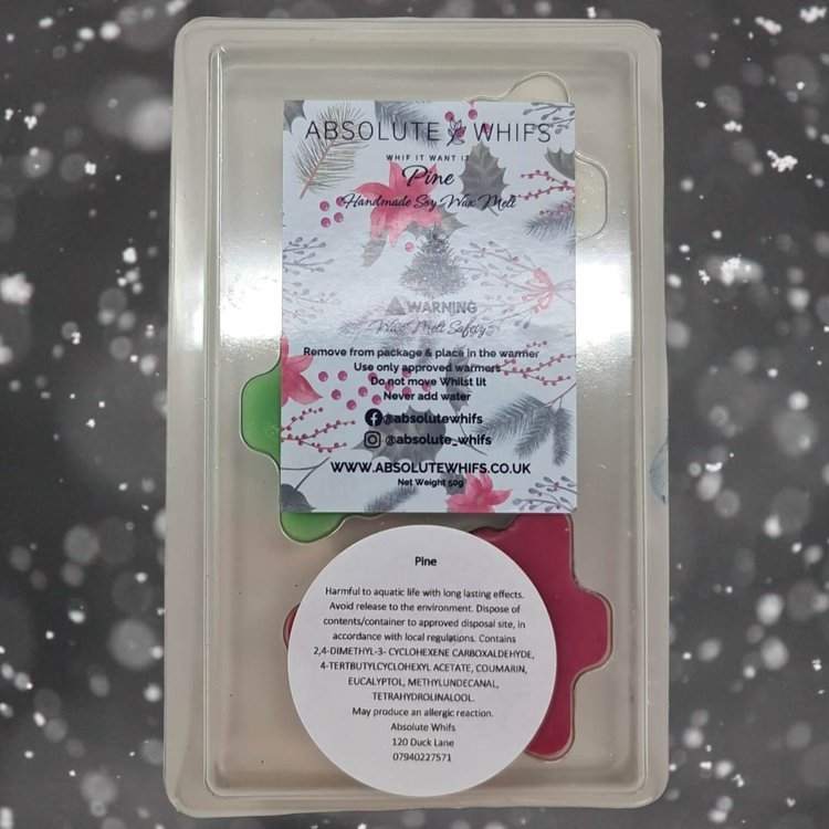 Christmas tree scented wax melts in festive colors, providing a luxurious pine and tuberose aroma.