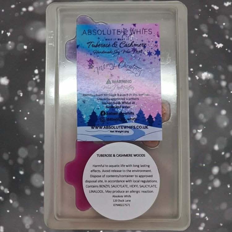 Christmas Tree scented wax melts with vibrant colors, shaped like trees, evoke warmth with pine, tuberose, and cashmere fragrances.
