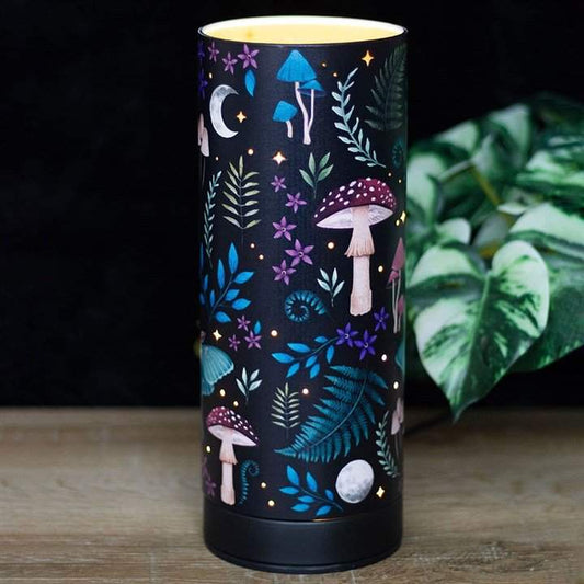 Dark Forest Print Electric Aroma Lamp with forest-inspired design on a wooden table.