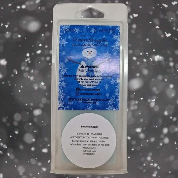 Festive Snuggles Wax Melt Snap Bar with winter-themed packaging and cozy scent description.
