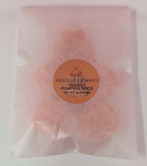 Pumpkin and skull pumpkin spice wax melts in packaging.