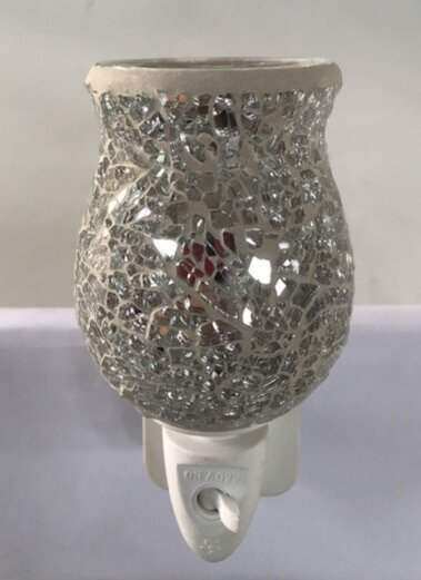 Mosaic Plug In Glass Fragrance Warmer with intricate design elevates home ambiance.