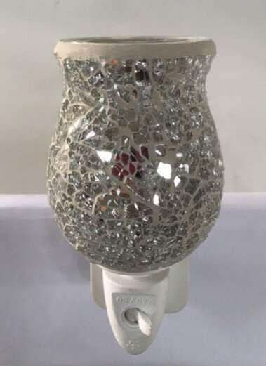 Mosaic Plug In Glass Fragrance Warmer with intricate design elevates home ambiance.
