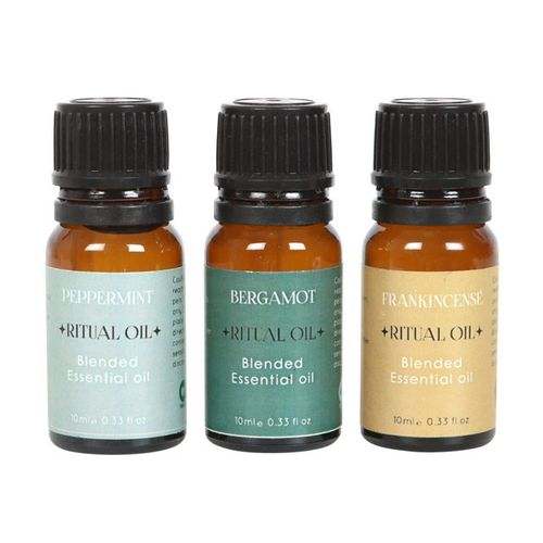 Set of 3 Success Ritual Blended Essential Oils: Peppermint, Bergamot, Frankincense bottles.