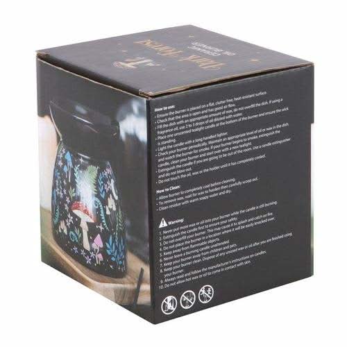 Dark forest print oil burner with colorful flora and fauna design on packaging.
