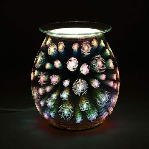 Colorful 3D starburst electric oil burner on dark background.