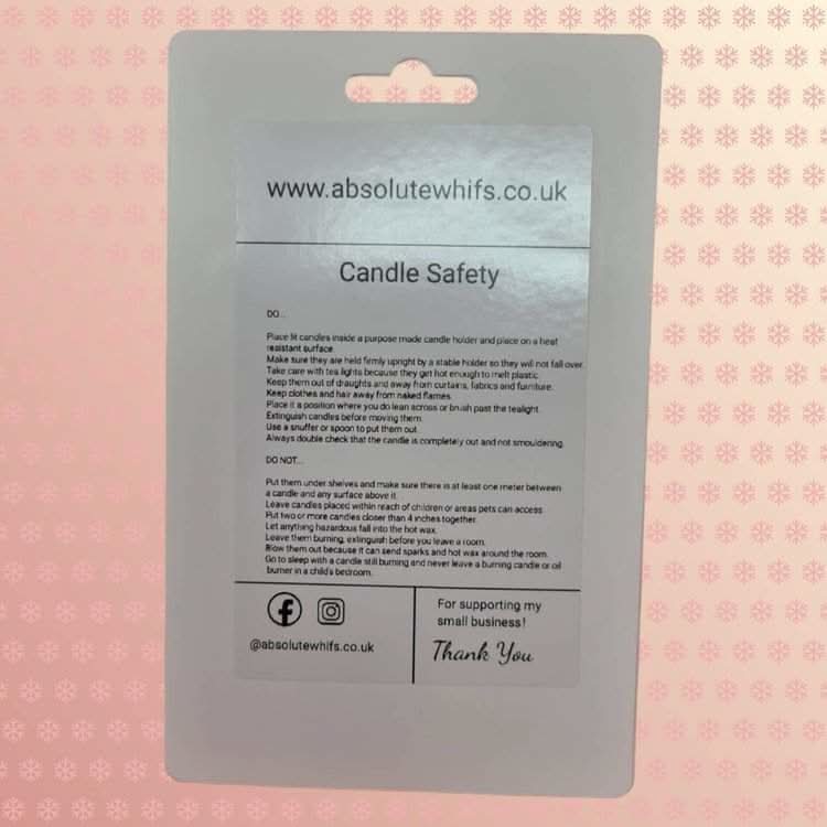 Back of package for unscented tea lights with safety instructions and branding.