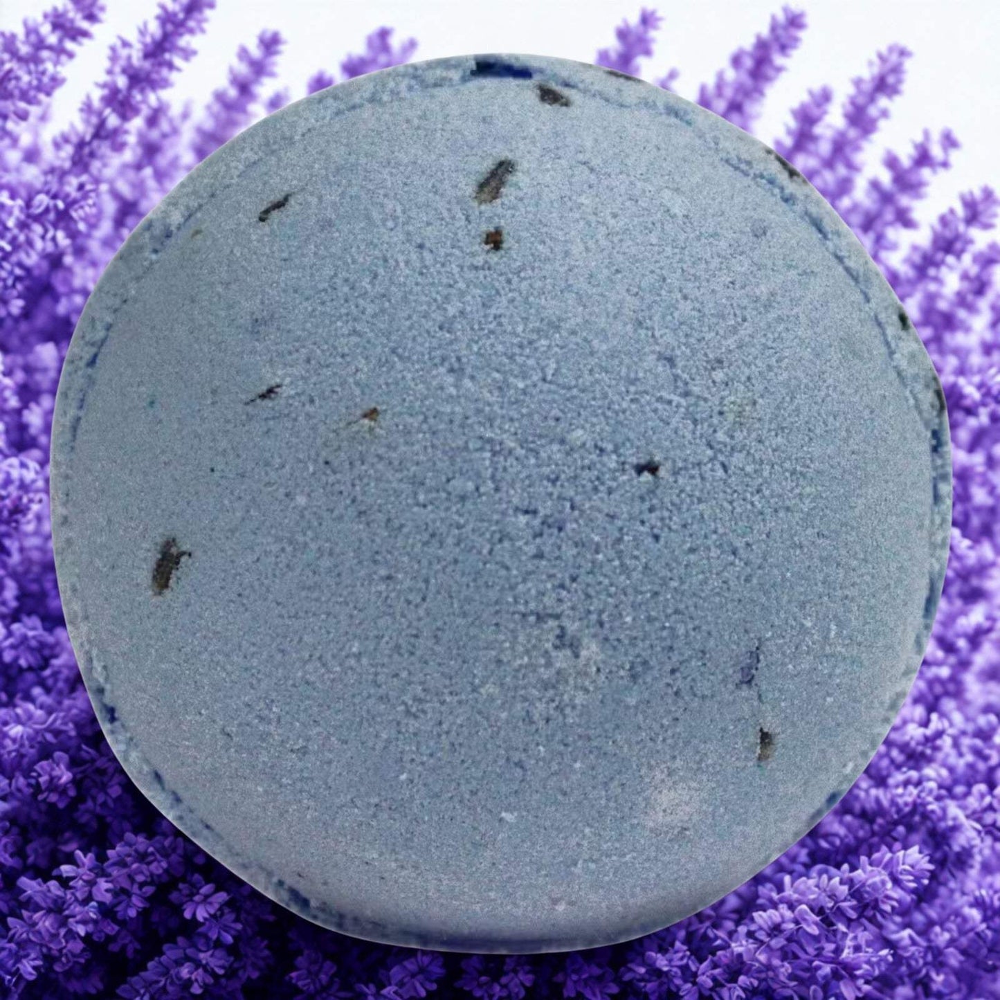 Lavender & Seeds Bath Bomb with French lavender oil and seeds on lavender flowers background