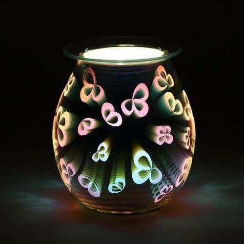 3D Flower Petal Light Up Electric Oil Burner with glowing multicolored illuminated 3D flower petal pattern on black background