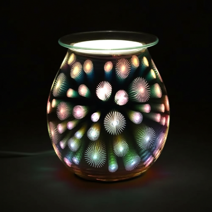 3D Starburst Light Up Electric Oil Burner with colorful illuminated starburst pattern on a glass and plastic spherical body