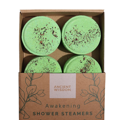 Zen Shower Steamers Awakening gift set with four green aromatherapy steamers infused with orange, eucalyptus, peppermint, and mixed herbs essential oils in eco-friendly packaging.