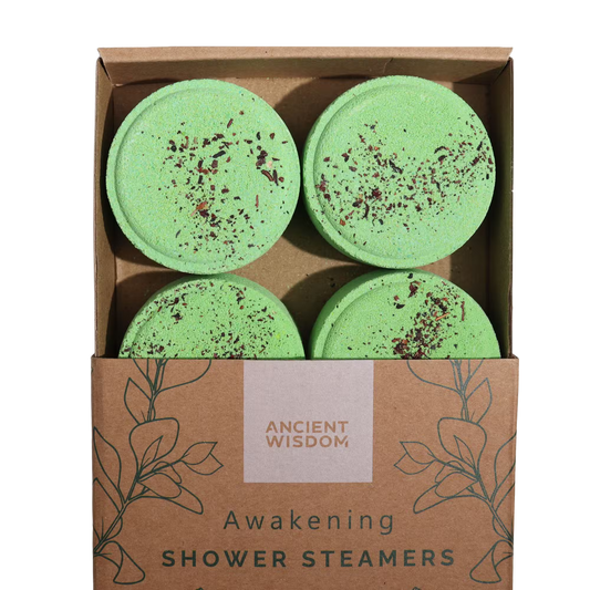 Zen Shower Steamers Awakening gift set with four green aromatherapy steamers infused with orange, eucalyptus, peppermint, and mixed herbs essential oils in eco-friendly packaging.
