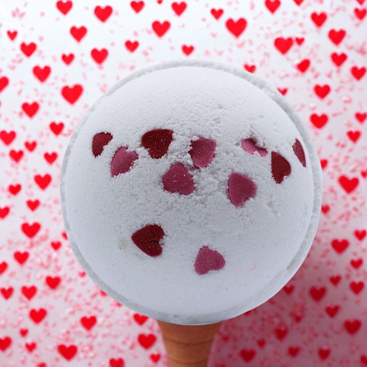 Love Hearts Bath Bomb scented with wild flowers and decorated with red heart shapes