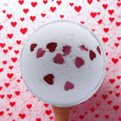 Love Hearts Bath Bomb scented with wild flowers and decorated with red heart shapes