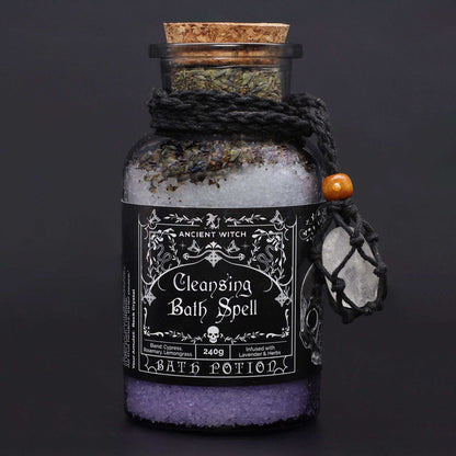 Ancient witch bath spell cleansing potion in apothecary bottle with rock crystal amulet