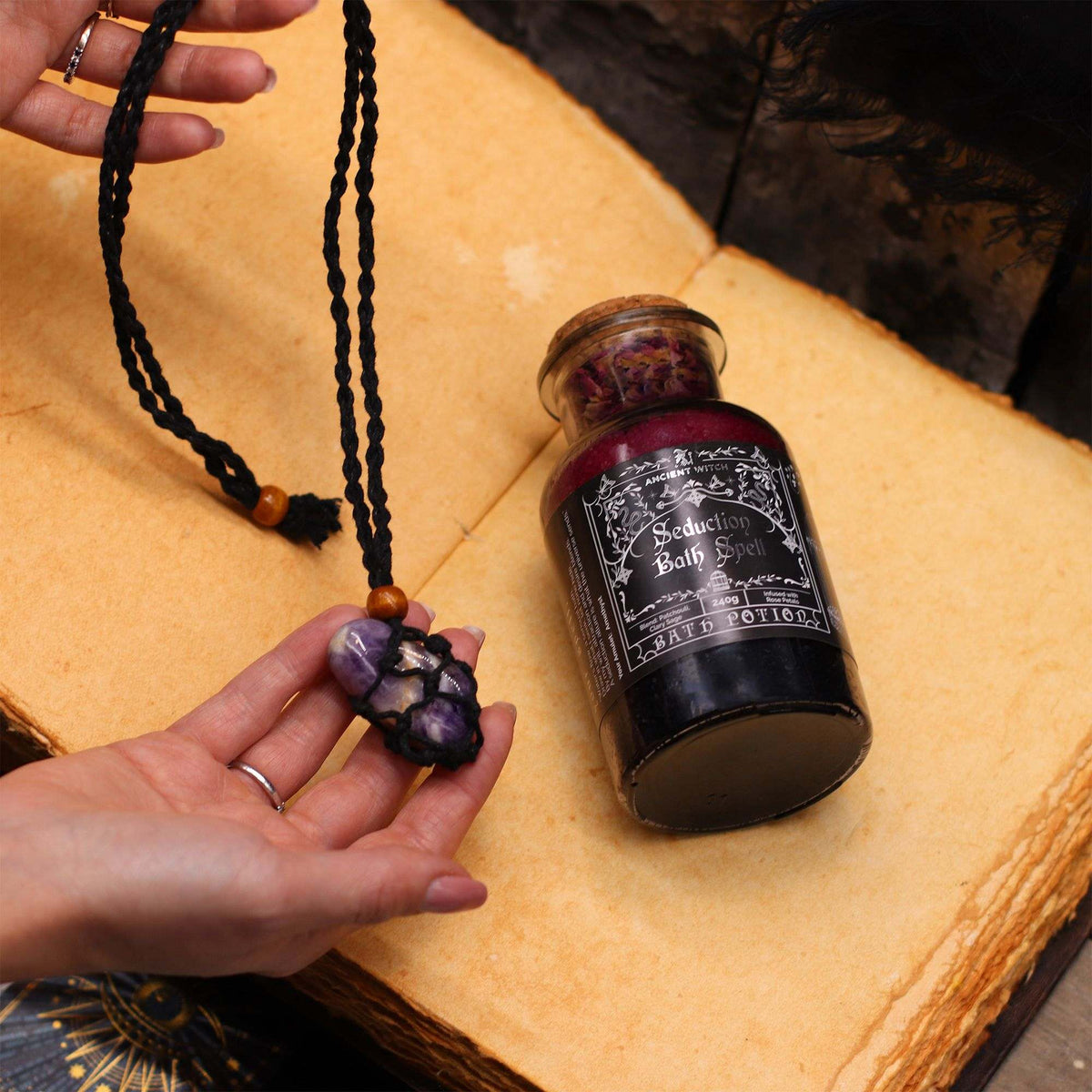 Ancient witch bath spell prosperity potion with aventurine crystal amulet