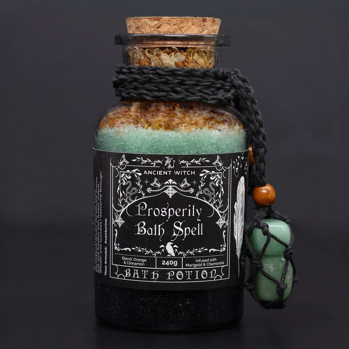 Ancient witch bath spell prosperity potion bottle with aventurine crystal amulet