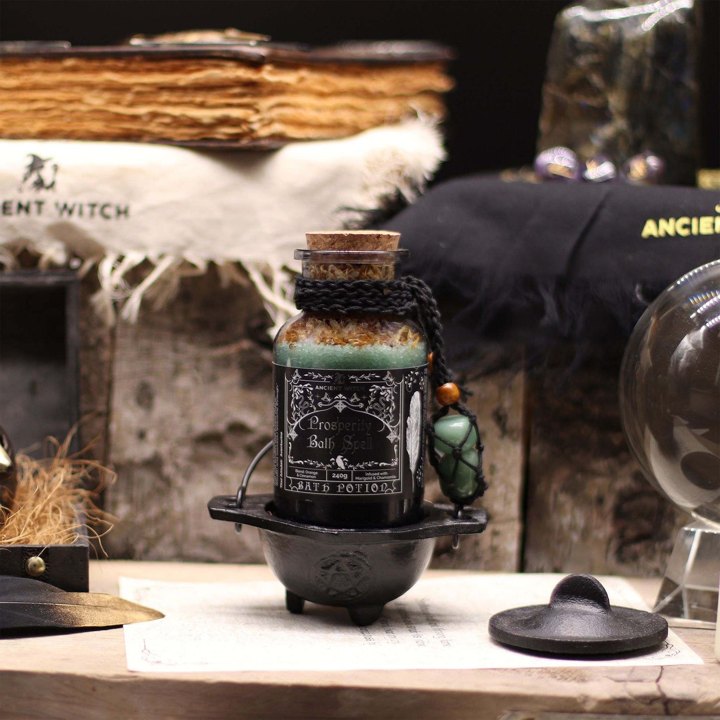 Ancient Witch Bath Spell Prosperity potion with aventurine amulet in apothecary bottle