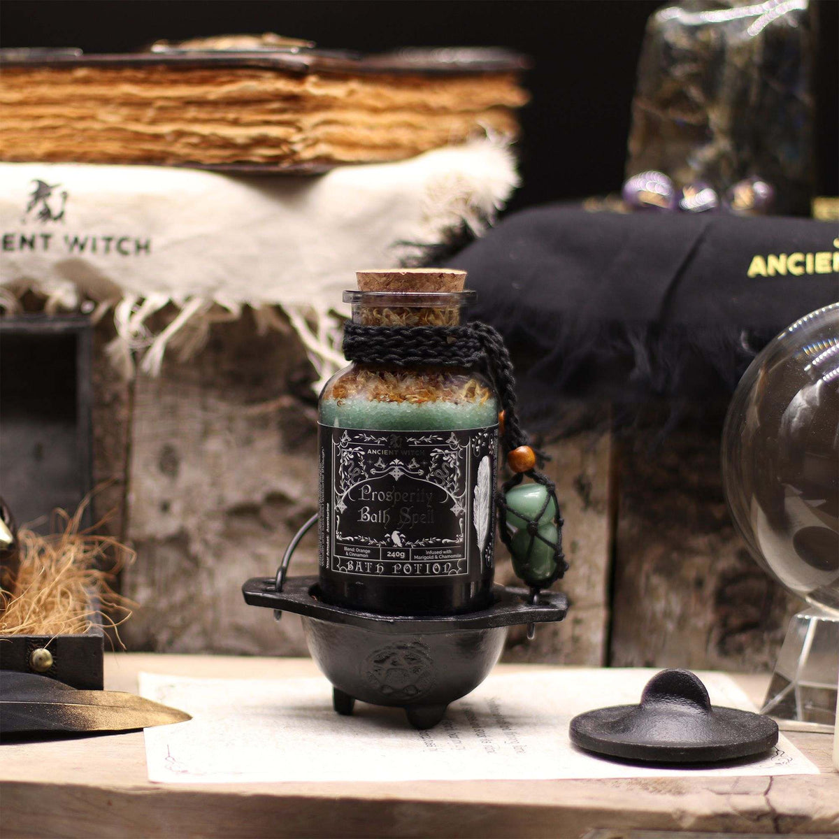 Ancient Witch Bath Spell Prosperity potion with aventurine amulet in apothecary bottle