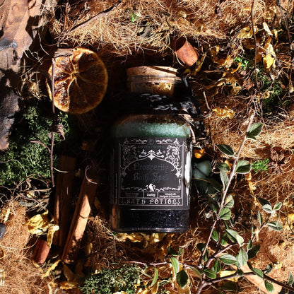 Ancient witch bath spell bottle with aventurine crystal amulet for prosperity