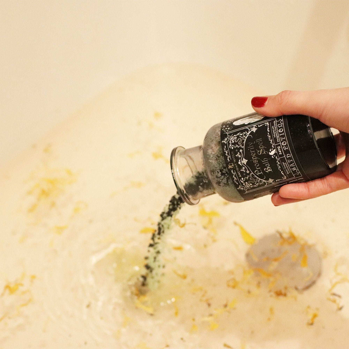 Ancient Witch Bath Spell Prosperity potion bottle with aventurine crystal amulet