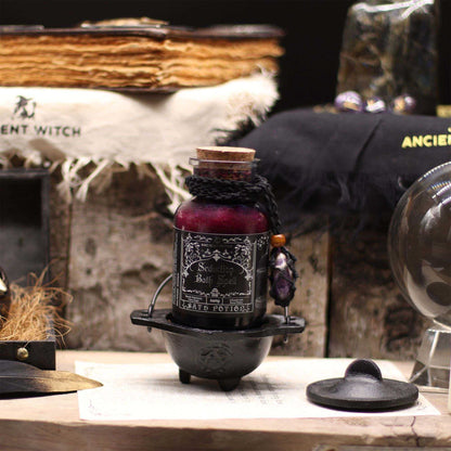 Ancient witch bath spell with amethyst crystal amulet and rose petal bath salts
