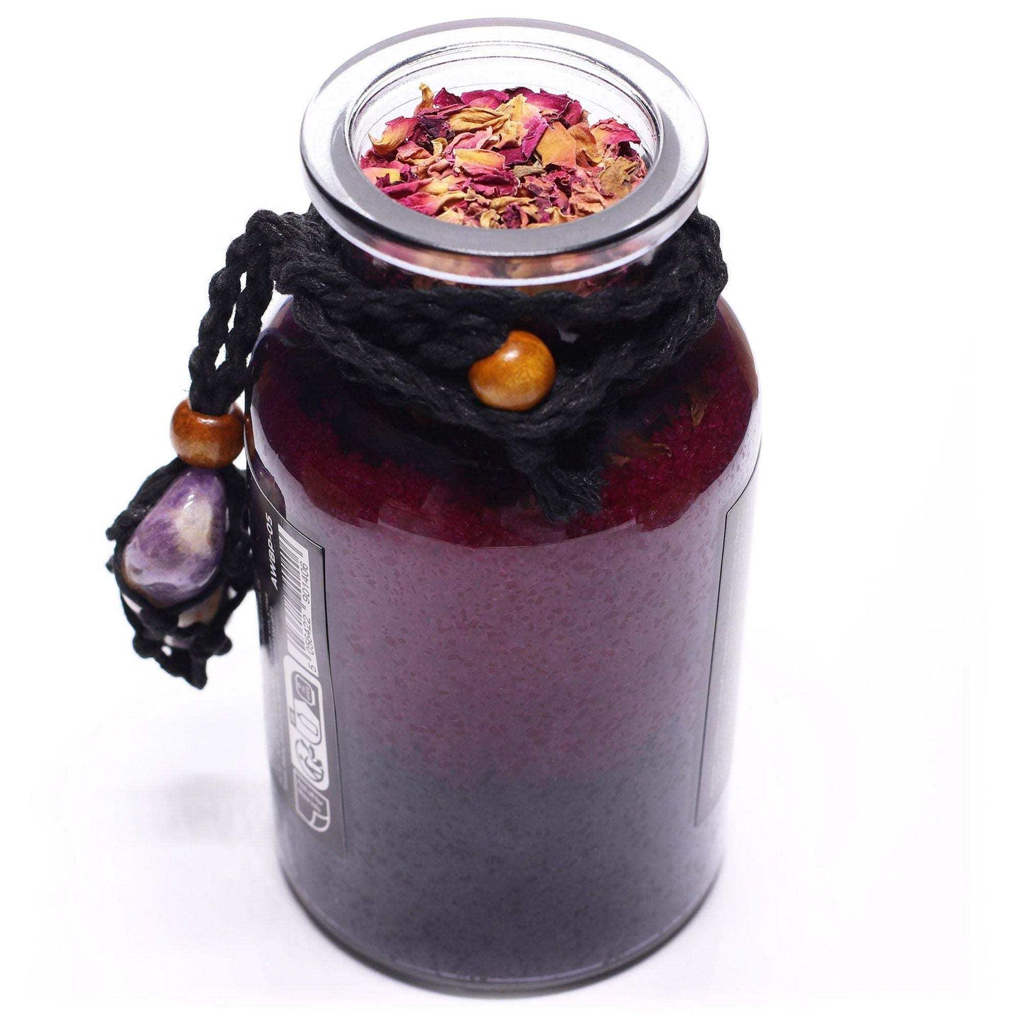 Ancient witch bath spell jar with amethyst crystal amulet and rose petals for seduction ritual