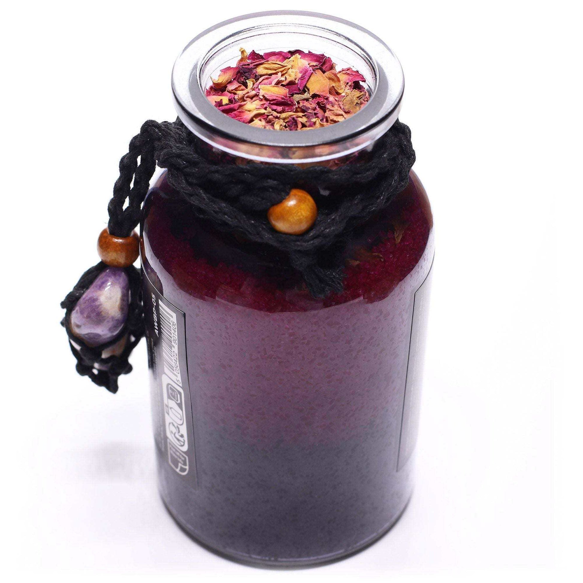 Ancient witch bath spell jar with amethyst crystal amulet and rose petals for seduction ritual