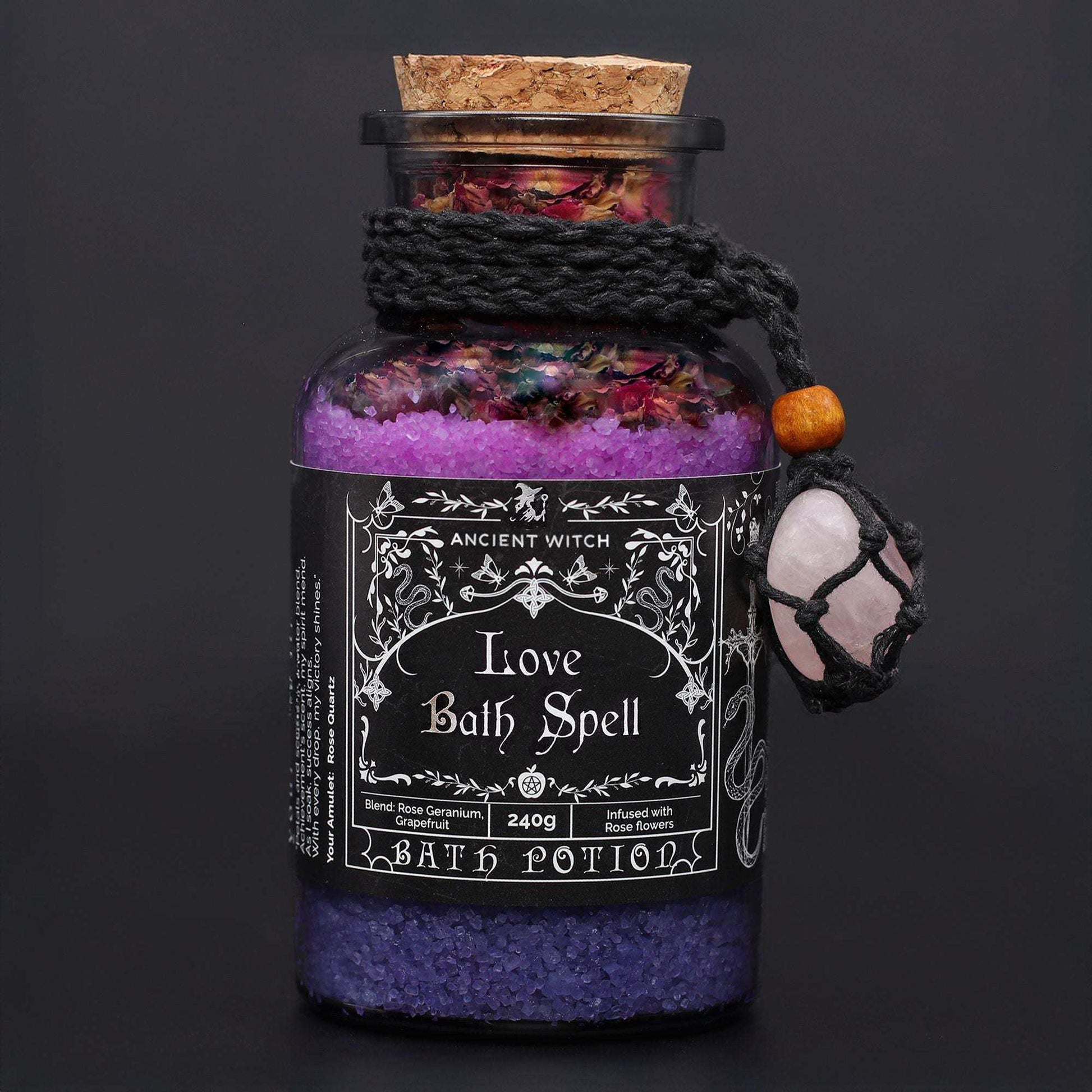 Ancient Witch Love Bath Spell with rose quartz amulet in glass bottle