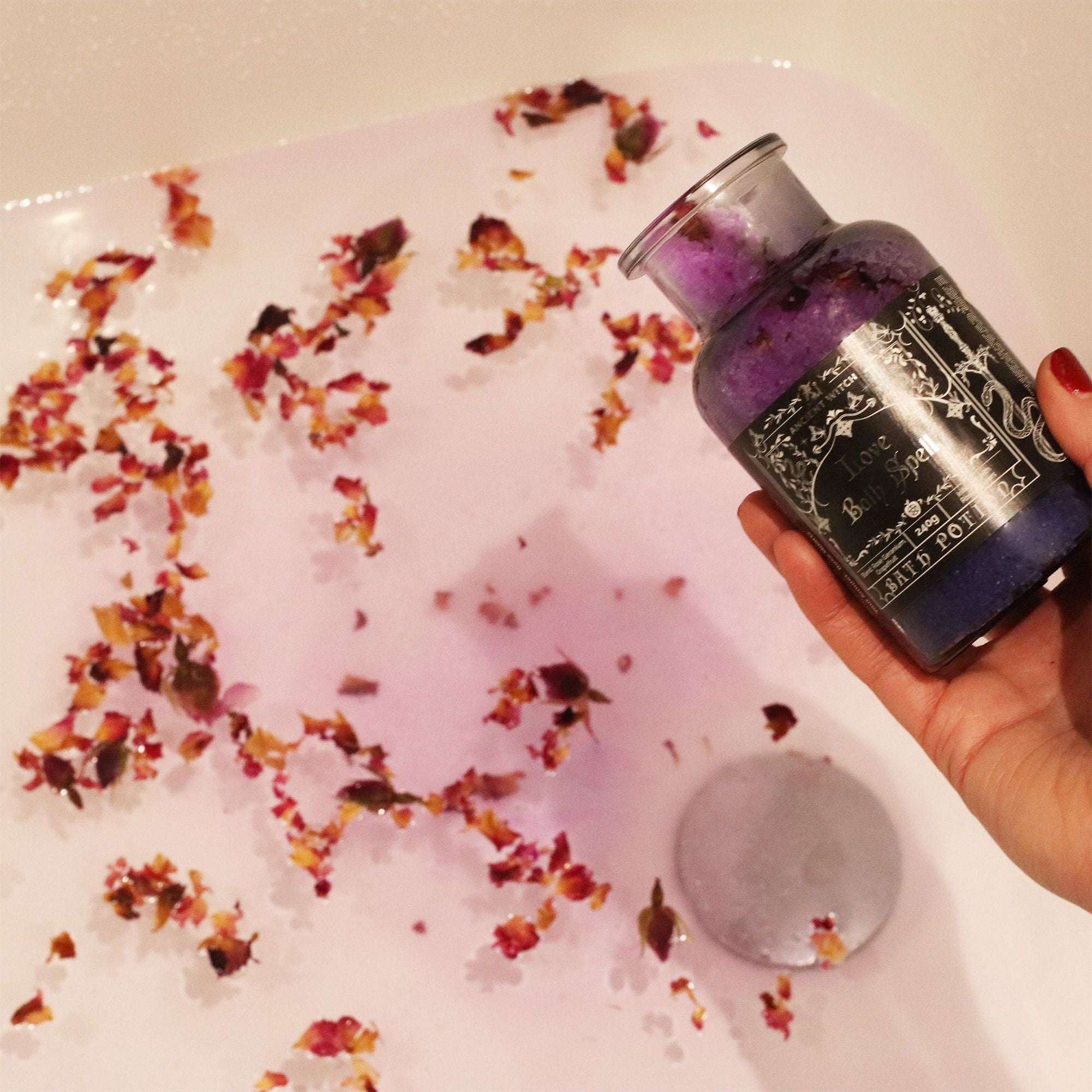 Ancient Witch love bath spell potion with rose quartz amulet