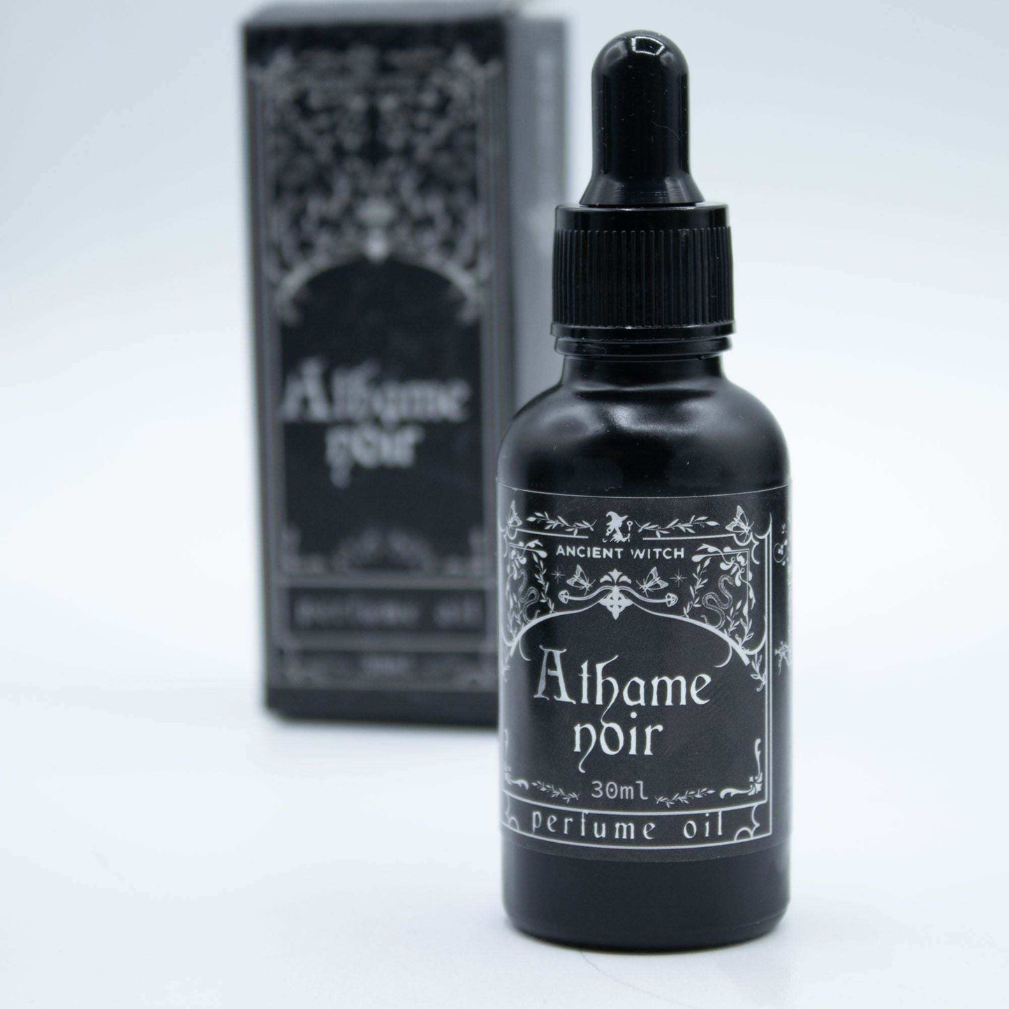 Ancient Witch Perfume Oil - Atheme Noir in sleek black bottle with gold lettering and minimalist design
