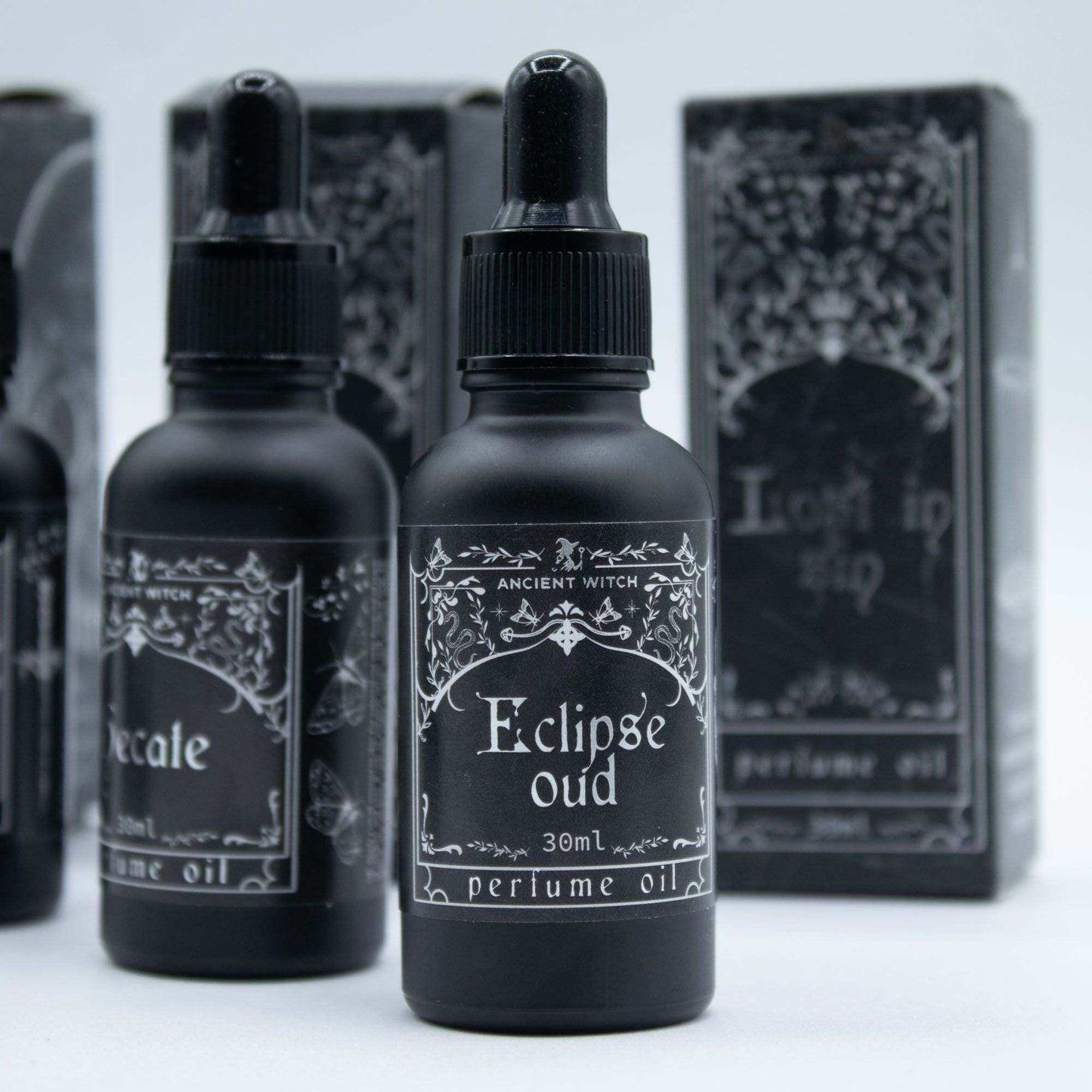 Ancient Witch Perfume Oil - Eclipse Oud bottle with smoky fragrance notes