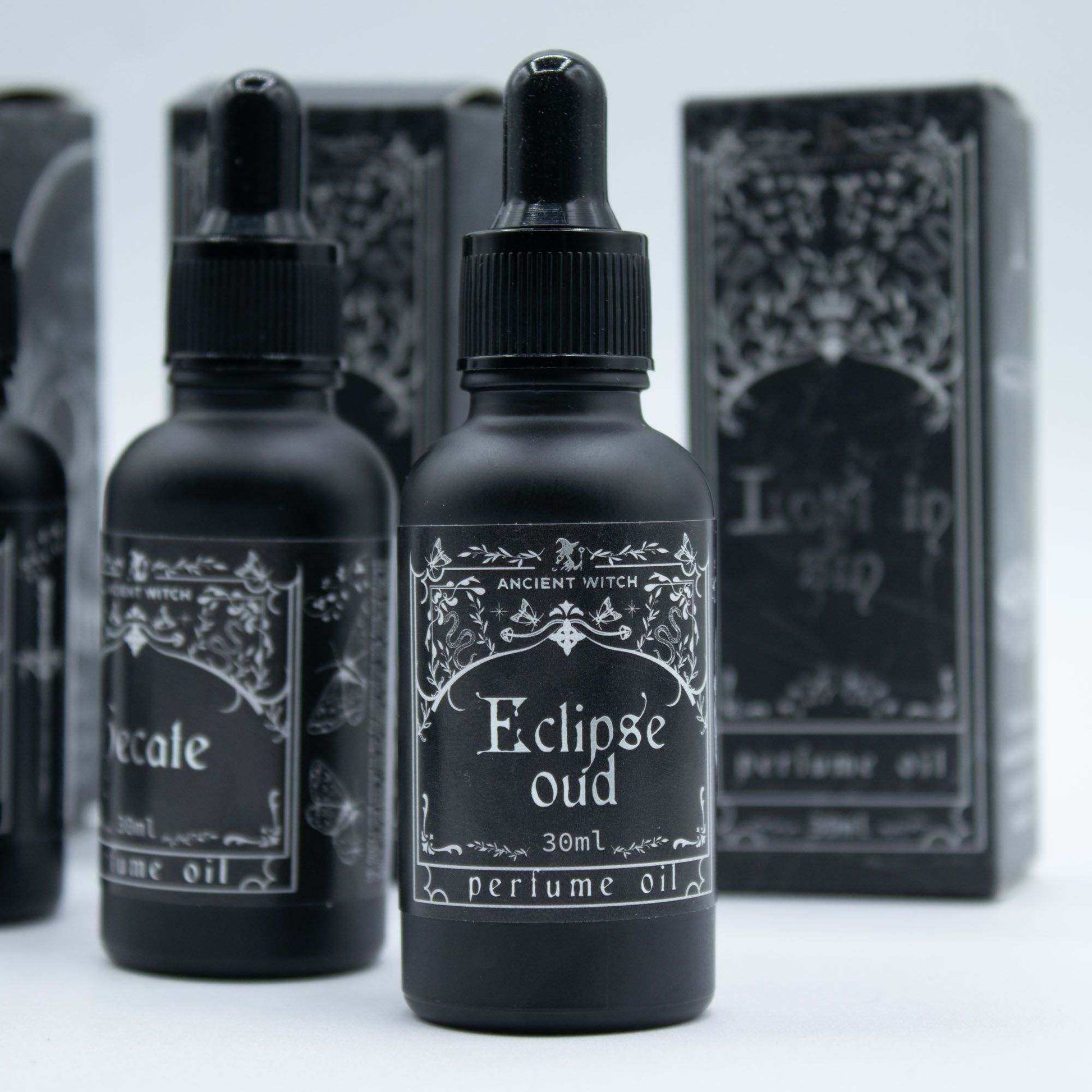 Ancient Witch Perfume Oil - Eclipse Oud bottle with smoky fragrance notes