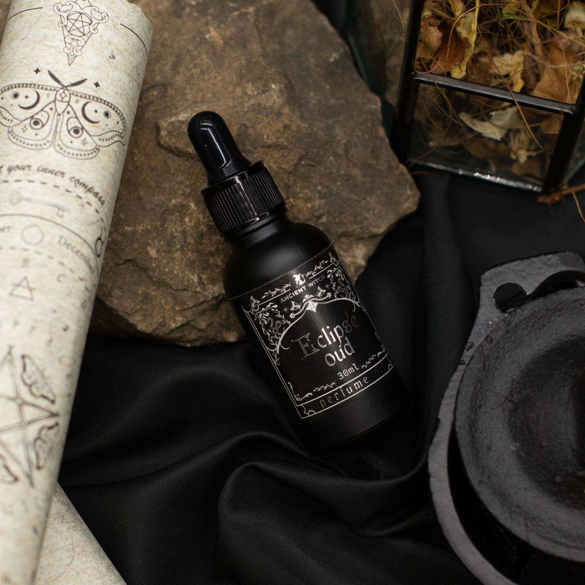Bottle of Ancient Witch Perfume Oil - Eclipse Oud with smoky and spicy fragrance