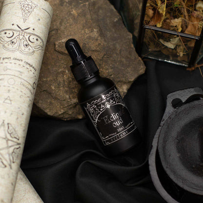 Bottle of Ancient Witch Perfume Oil - Eclipse Oud with smoky and spicy fragrance