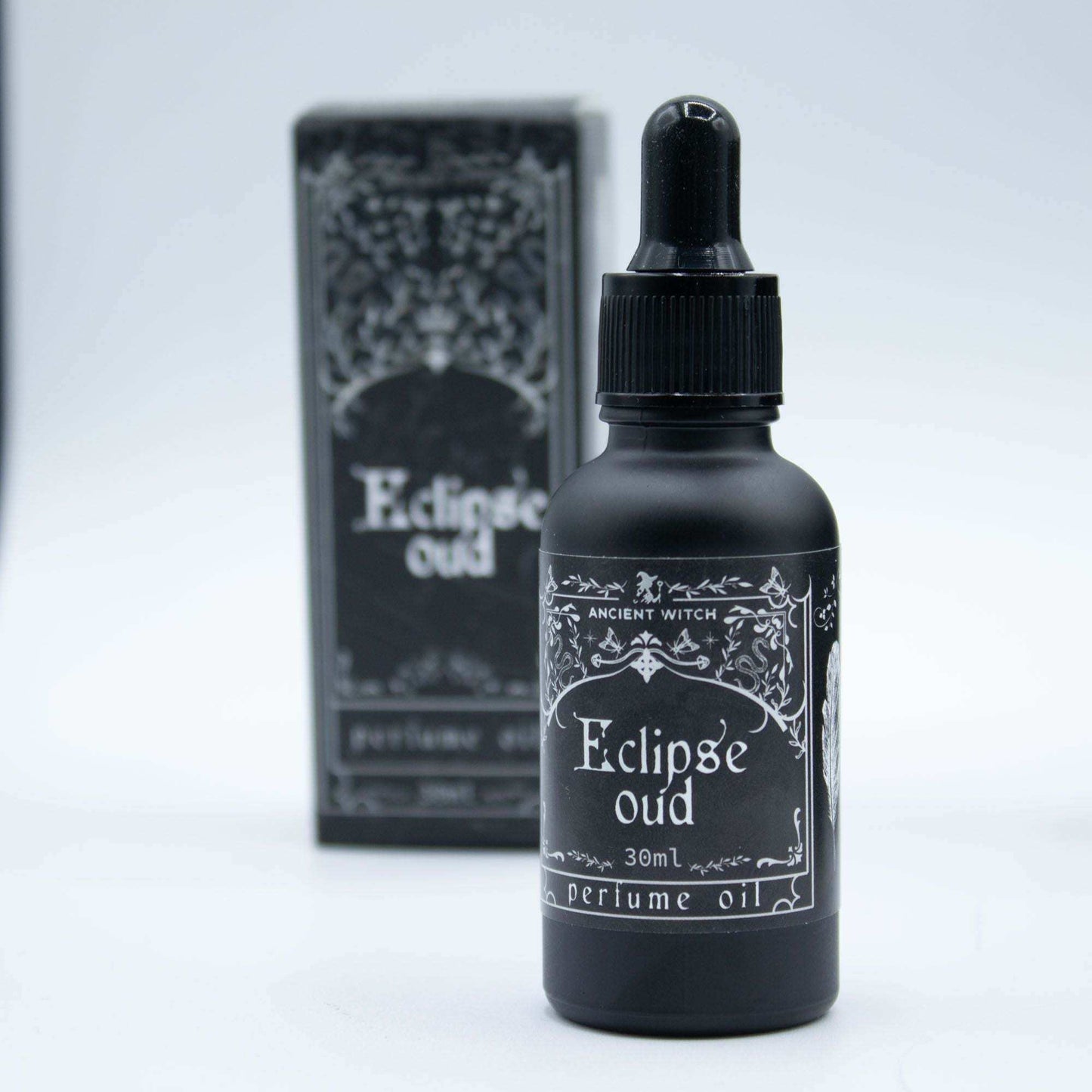 Ancient Witch Perfume Oil - Eclipse Oud in black bottle with golden label