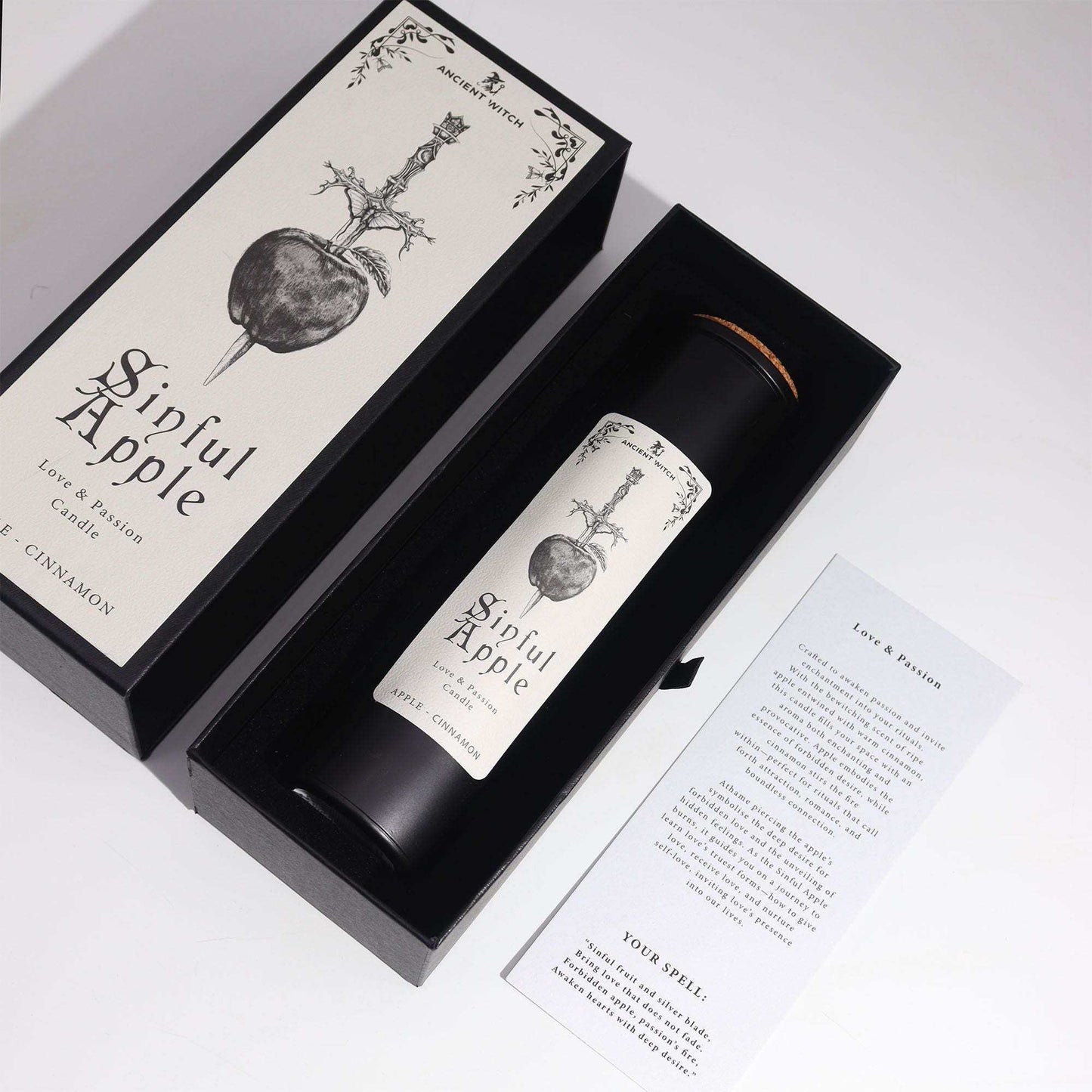 Ancient Witch Ritual Candle Sinful Apple with knife through apple design and cinnamon apple scent in gift box
