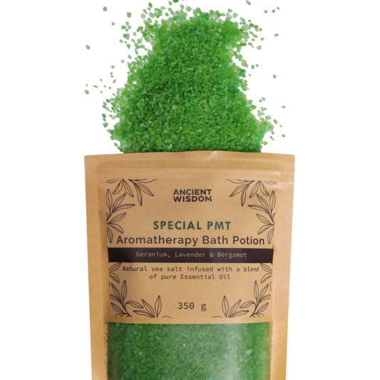 Aromatherapy Bath Potion - PMT green coarse sea salt crystals spilling from a 350g kraft paper bag with botanical design and essential oil blend label