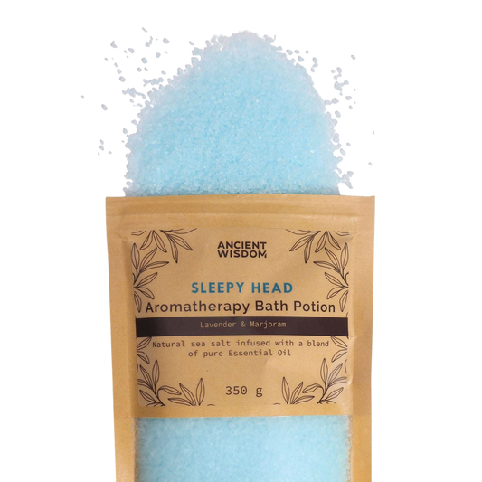 Aromatherapy Bath Potion - Sleepy Head in kraft bag with blue sea salt crystals spilling out, infused with lavender and marjoram