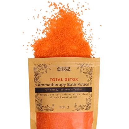 Aromatherapy Bath Potion - Total Detox in natural kraft bag with orange mineral-rich sea salt crystals and essential oil blend