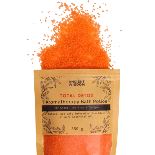 Aromatherapy Bath Potion - Total Detox in natural kraft bag with orange mineral-rich sea salt crystals and essential oil blend