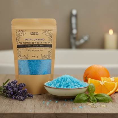 Aromatherapy Bath Potion - Total Unwind in kraft bag containing blue bath salts with lavender, orange, and basil accents
