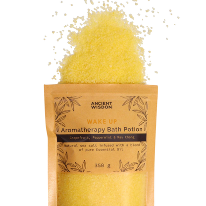 Aromatherapy Bath Potion - Wake Up in kraft paper bag with yellow sea salt granules infused with essential oils