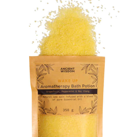 Aromatherapy Bath Potion - Wake Up in kraft paper bag with yellow sea salt granules infused with essential oils